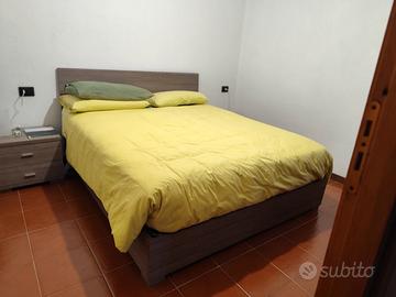 Letto contenitore matrimoniale e comodini