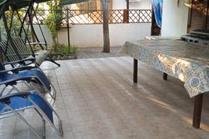 Piano terra con giardino