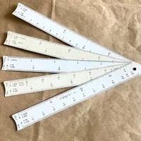 Due scalimetri multiscala piatti da tasca vintage