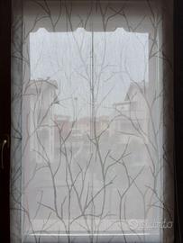 Tenda a pacchetto per finestra