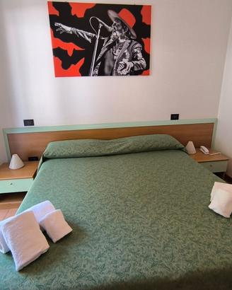 Camera da letto matrimoniale con angolo cottura 
