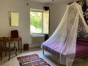 Stanza in casa condivisa