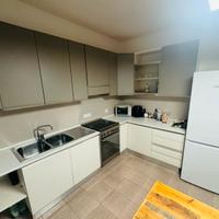 Cucina in legno ad angolo