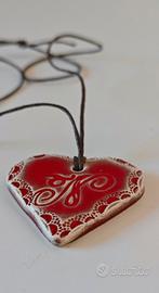 collana con ciondolo a forma di cuore