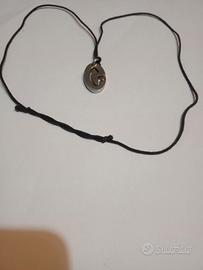 Collana con ciondolo stainless steel e cordino