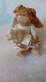 Statuina angelo con libro e uccellino