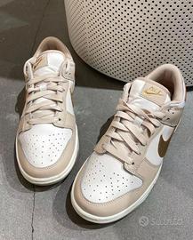 Nike Dunk Low Gancio in oro beige 38