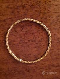 BRACCIALE FLEXIT IN ORO GIALLO 18 CT - STELLA MILA