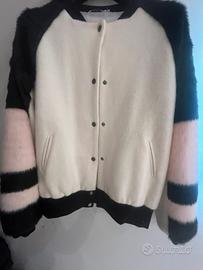 Pelliccia rosa nera e panna