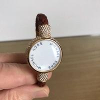 MICHAEL KORD bracciale in cuoio MARRONE