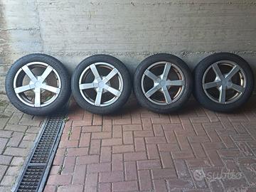 Set gomme multistagione + cerchi in lega
