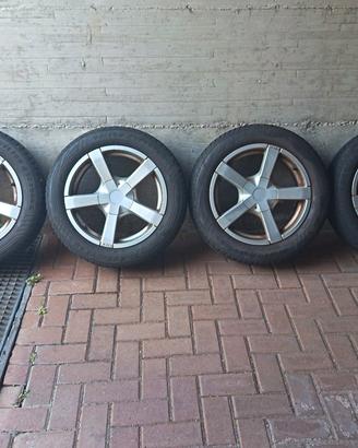 Set gomme multistagione + cerchi in lega