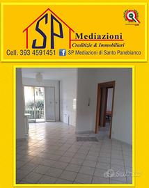 Appartamento con giardino e garage