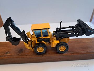 Pala gommata con retro escavatore VOLVO BM6300