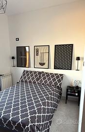 Camera singola + bagno in comune