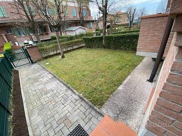 Villa a schiera centrale abbinata