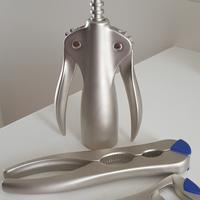 apri bottiglia + schiaccianoci 