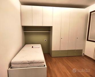 Armadio a ponte e letto camera ragazzi