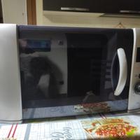 Forno microonde REX, PARI al NUOVO