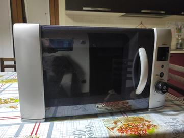 Forno microonde REX, PARI al NUOVO