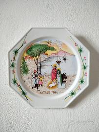 piatti decorativi in ceramica dipinti a mano