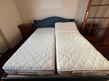 Letto matrimoniale con reti elettriche