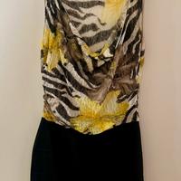 Abito con fantasia animalier e floreale