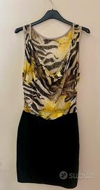 Abito con fantasia animalier e floreale