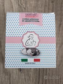 copricapezzoli in argento 