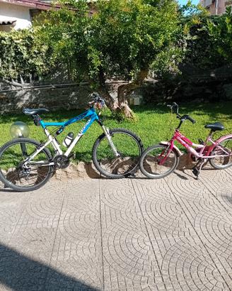 Biciclette uomo e bambina