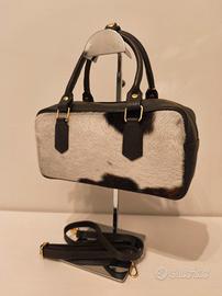 Borsa marrone a mano/tracolla muccata in pelle 