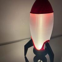 Luce notturna a forma di razzo