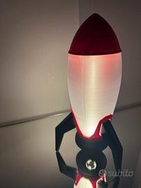 Luce notturna a forma di razzo