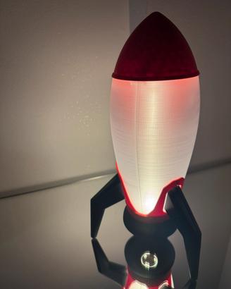 Luce notturna a forma di razzo