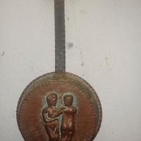 Decorazione in rame e ferro battuto