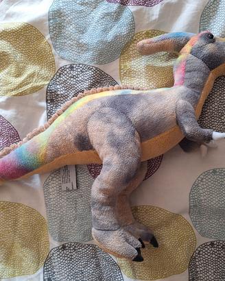 peluche di dinosauro colorato