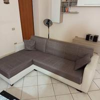 Divano letto con parete attrezzata