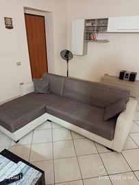 Divano letto con parete attrezzata