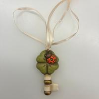 Thun chiave con quadrifoglio e coccinella