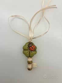 Thun chiave con quadrifoglio e coccinella
