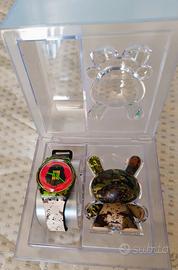Swatch x Kidrobot – Orologio Camouflage con Dunny 