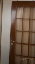 Porta in legno di noce con vetro