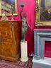 scultura-in-bronzo-su-base-in-travertino