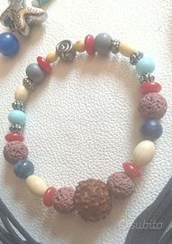 Lotto collana orecchini bracciali e ciondolo