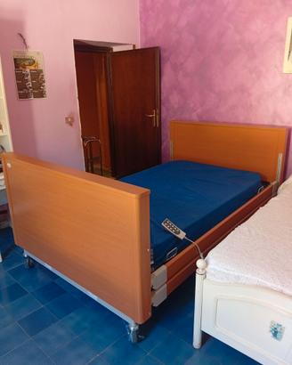Letto ortopedico con materasso antidecubito