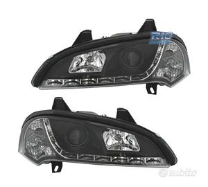 FARI PER OPEL TIGRA 95-03 LUCE DIURNA A LED FONDO 