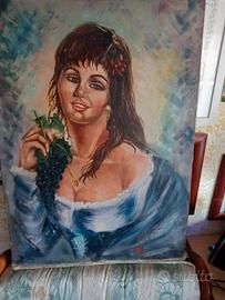 Donna popolare con grappolo d'uva