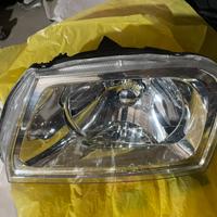Faro sinistro elettrico mitsubishi L200 96-05 k74