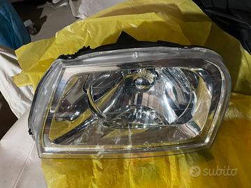 Faro sinistro elettrico mitsubishi L200 96-05 k74