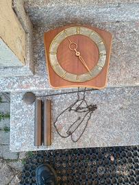orologio a pendolo da muro